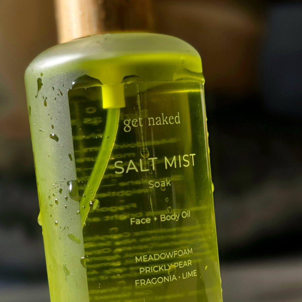 Get Naked Salt Mist lightweight Australian face and body oil in green glass bottle